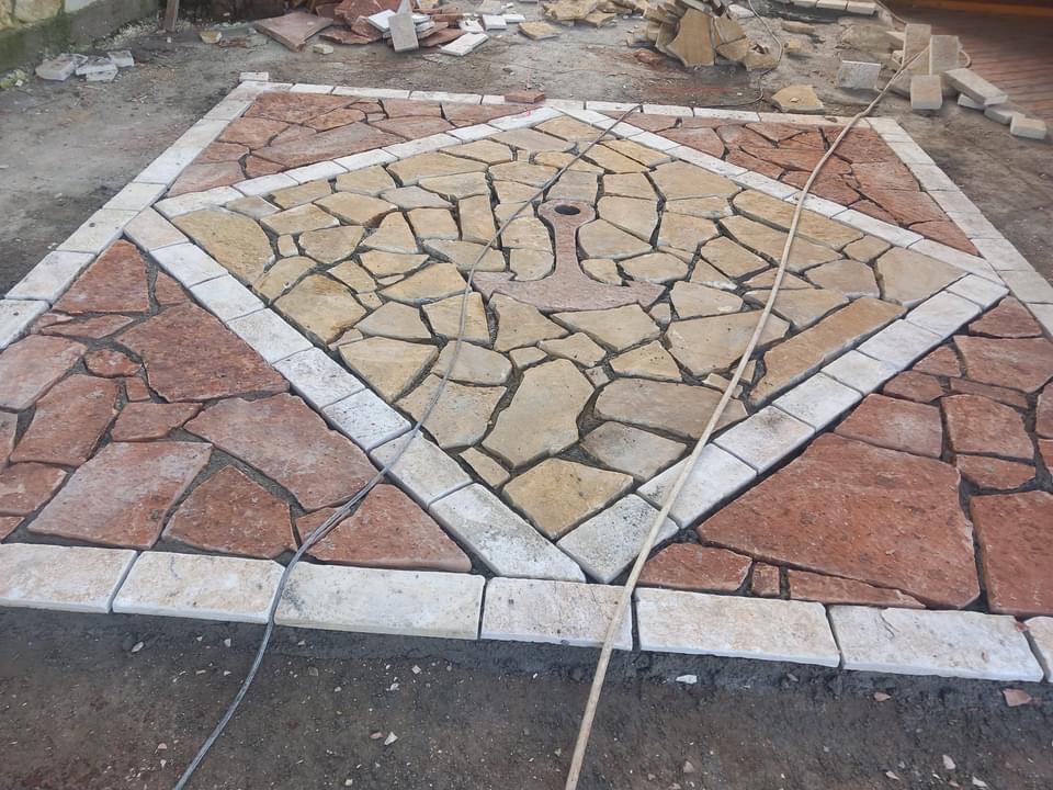 A crazy-paving patio laid in a diamond pattern